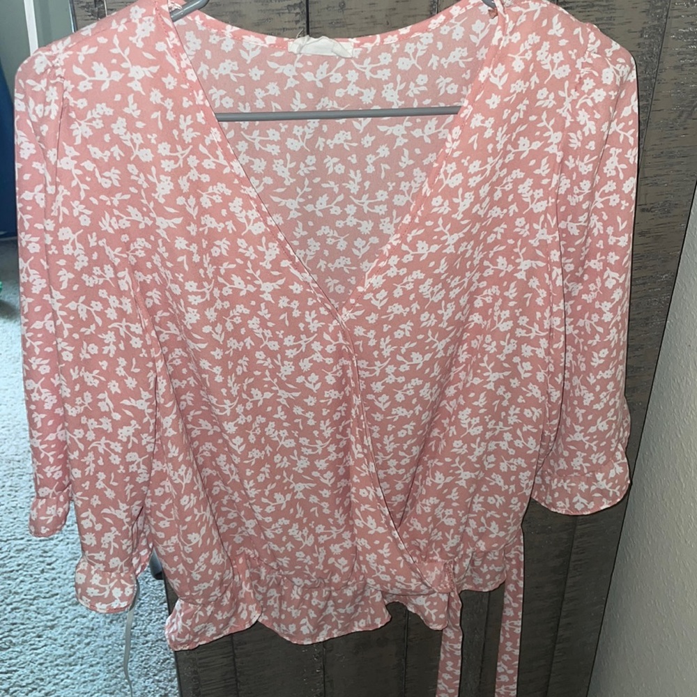 Pink blouse.